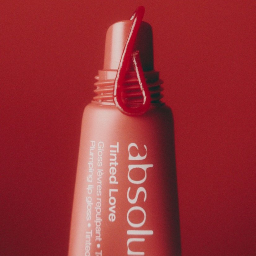 ABSOLUTION Tinted Love – Aufpolsterndes, getöntes Lipgloss mit Radieschenextrakt 12 ml